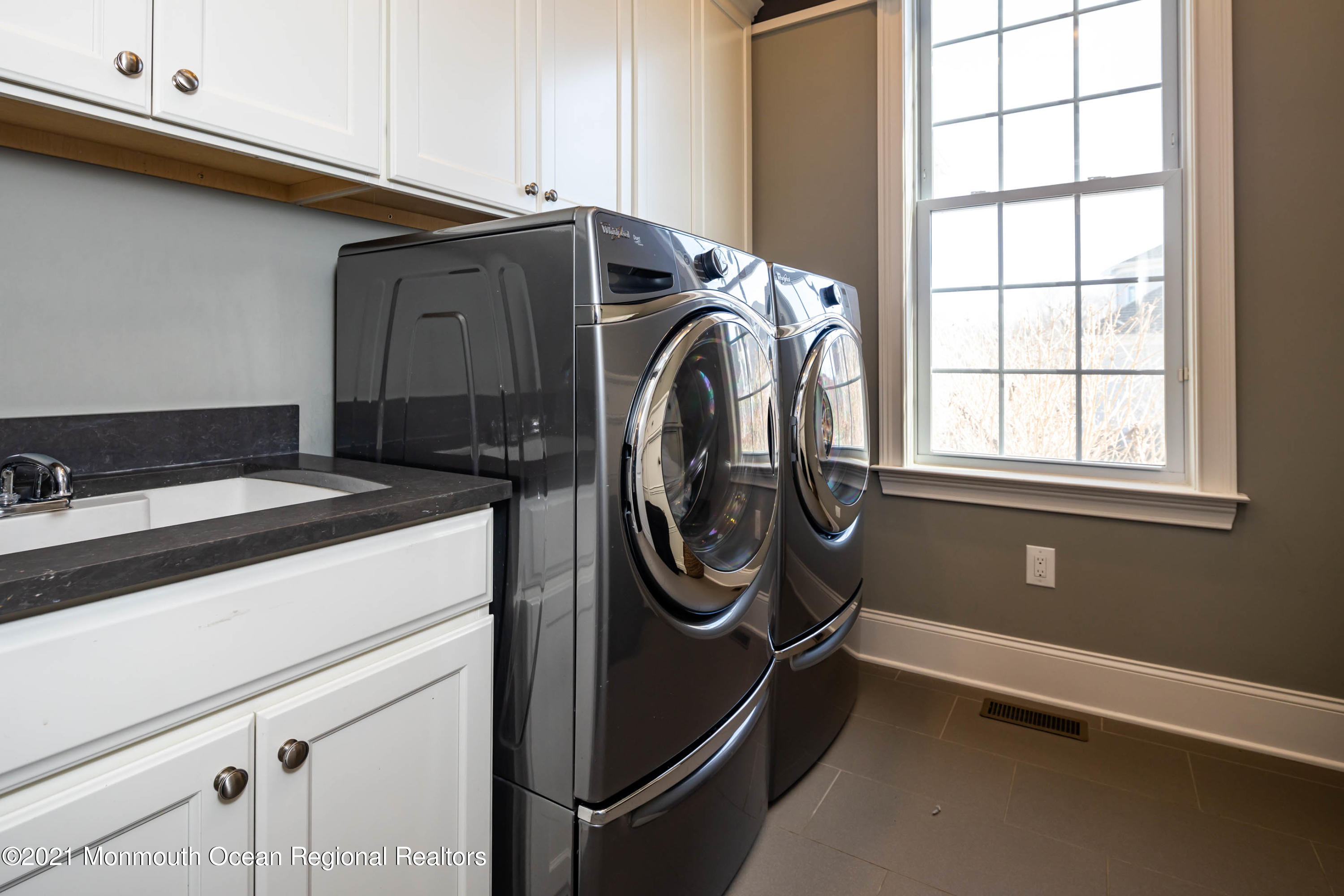 8 Strathmore Road Lincroft, NJ 07738 - Photo 38 of 76 a utility room with dryer and washer