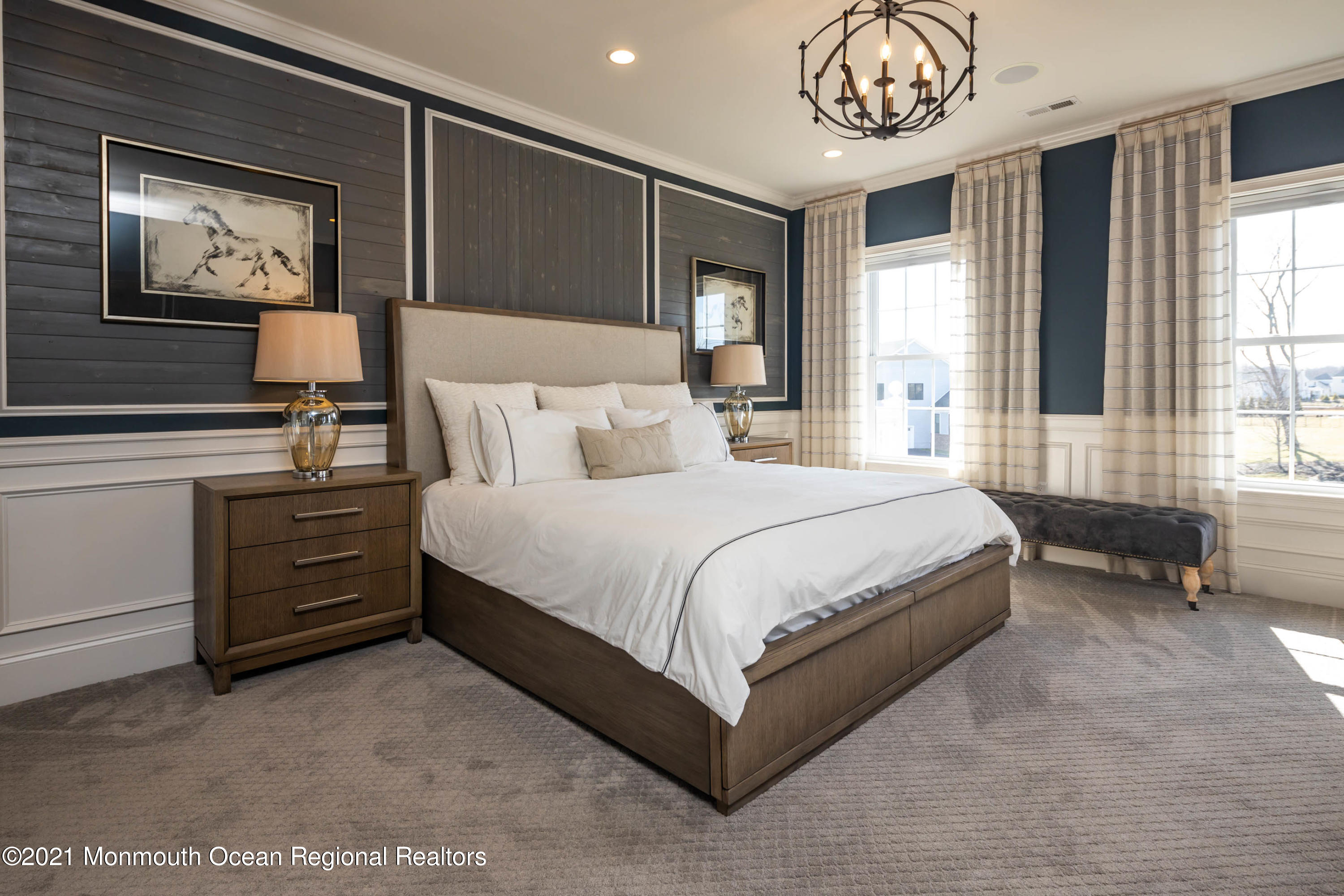 8 Strathmore Road Lincroft, NJ 07738 - Photo 39 of 76 a spacious bedroom with a bed a dresser and a large window