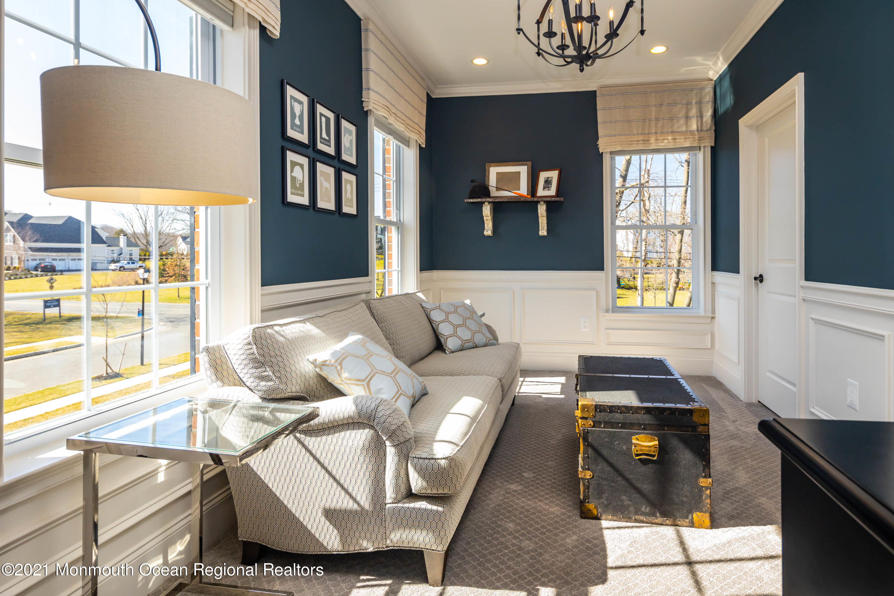 8 Strathmore Road Lincroft, NJ 07738 - Photo 41 of 76 a living room with furniture and a flat screen tv
