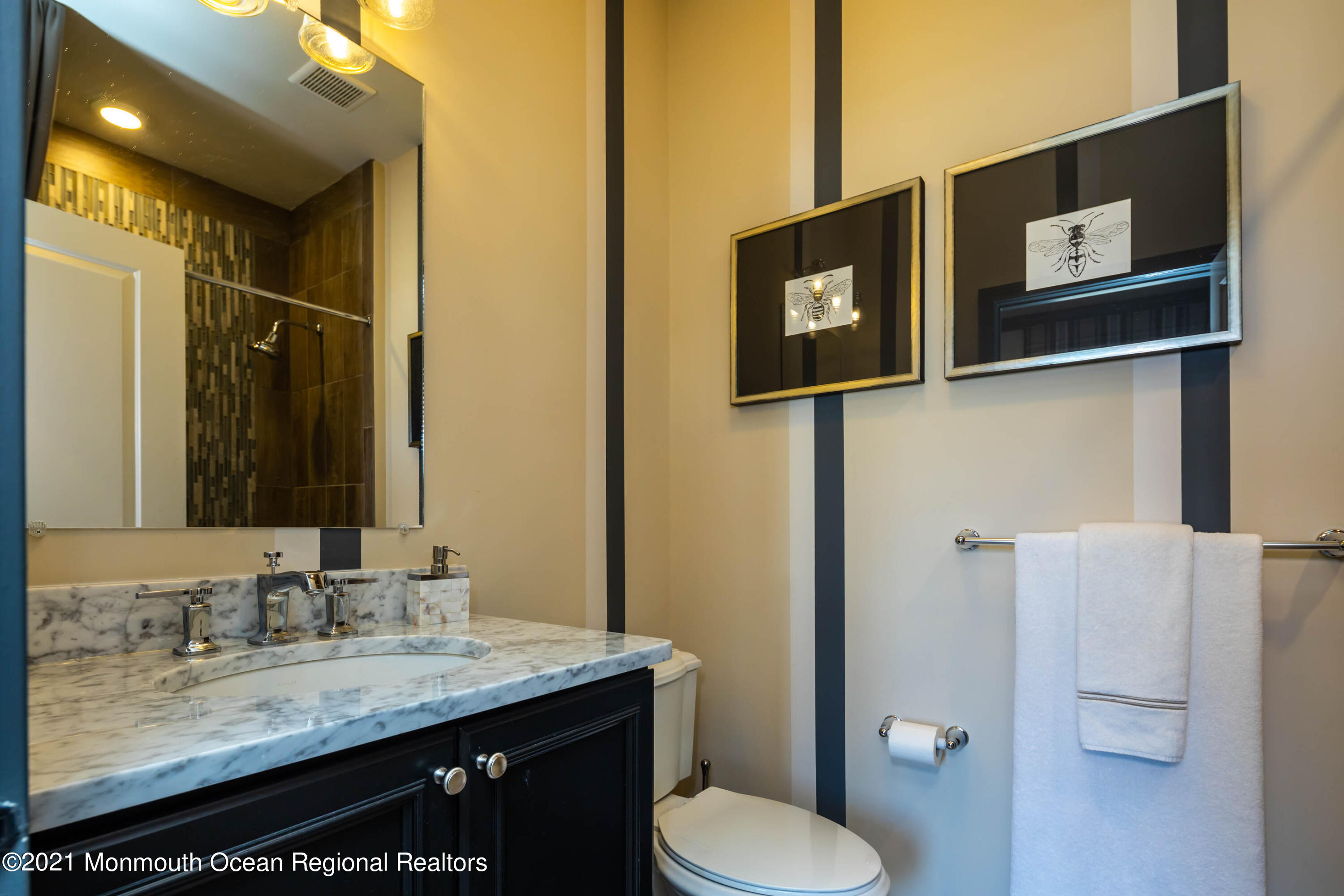 8 Strathmore Road Lincroft, NJ 07738 - Photo 45 of 76 a bathroom with a granite countertop sink toilet and mirror