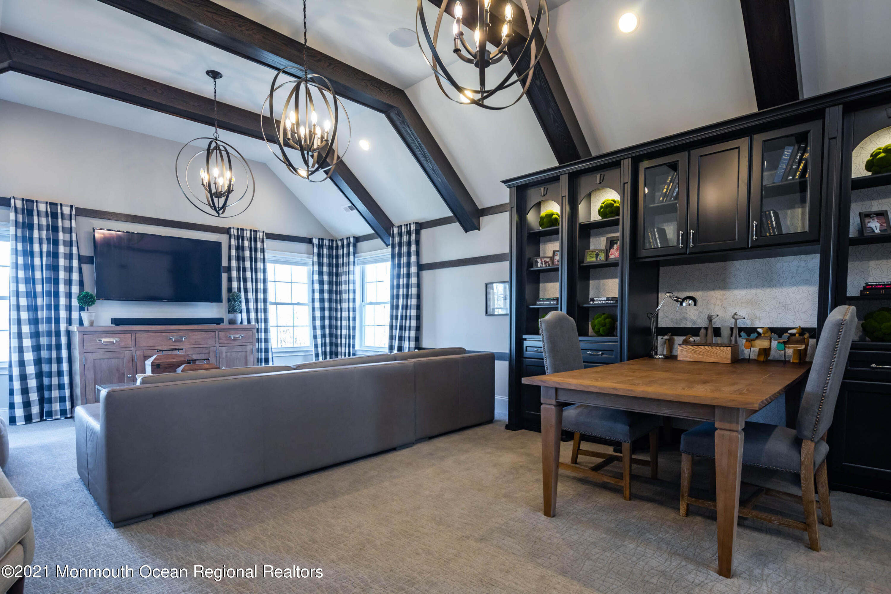 8 Strathmore Road Lincroft, NJ 07738 - Photo 53 of 76 a living room with furniture and a flat screen tv