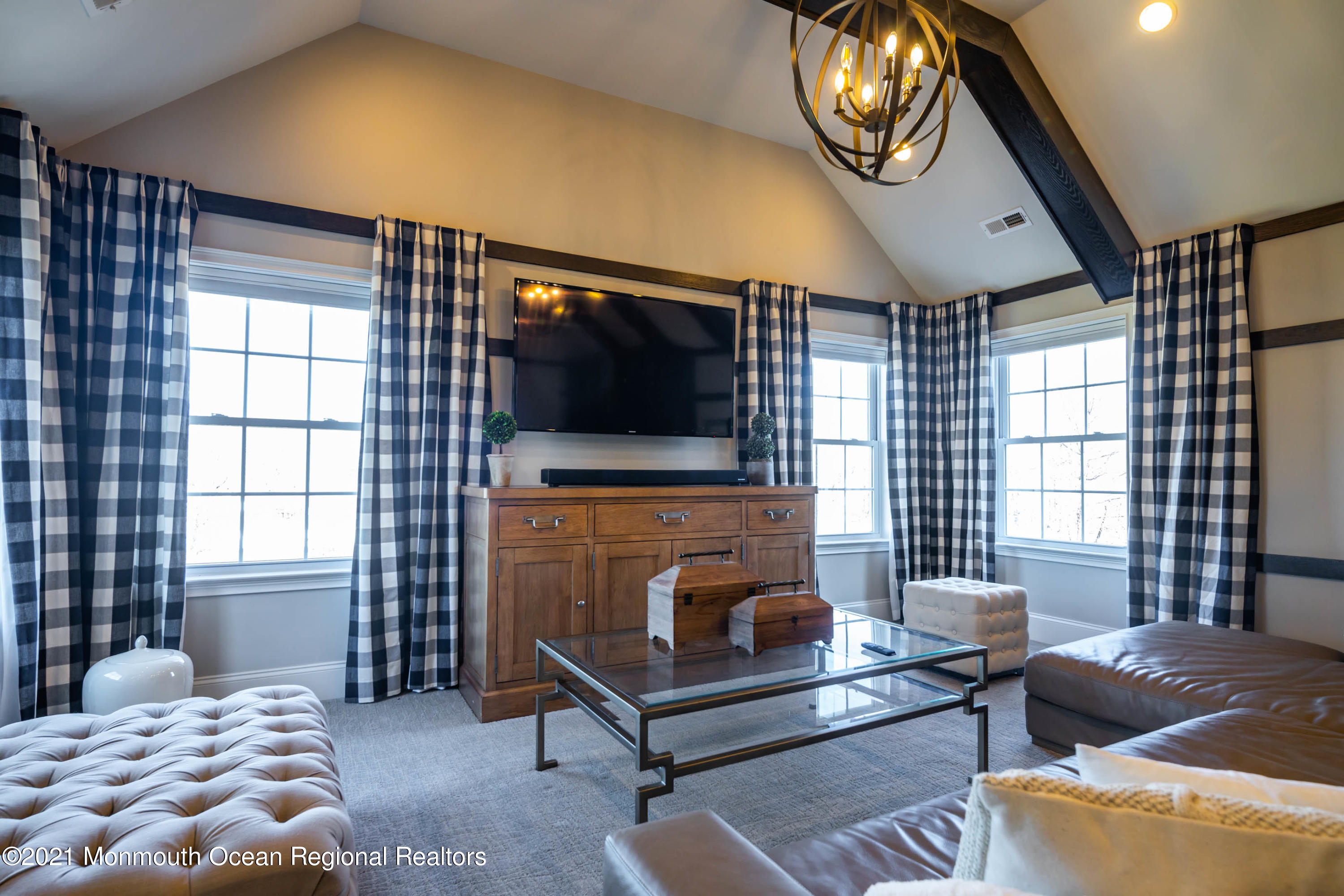8 Strathmore Road Lincroft, NJ 07738 - Photo 54 of 76 a living room with furniture and a flat screen tv