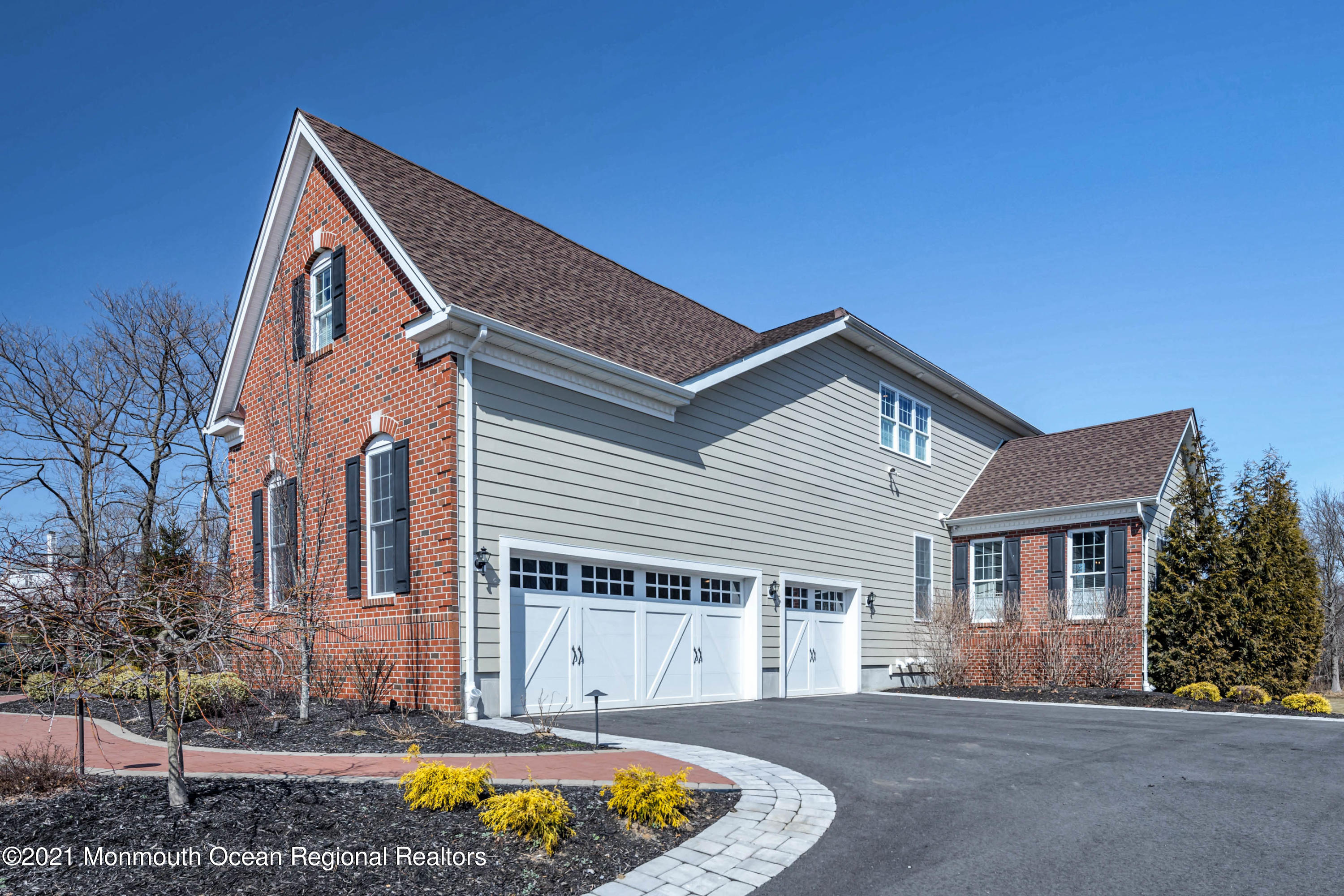 8 Strathmore Road Lincroft, NJ 07738 - Photo 8 of 76 a house view with a outdoor space
