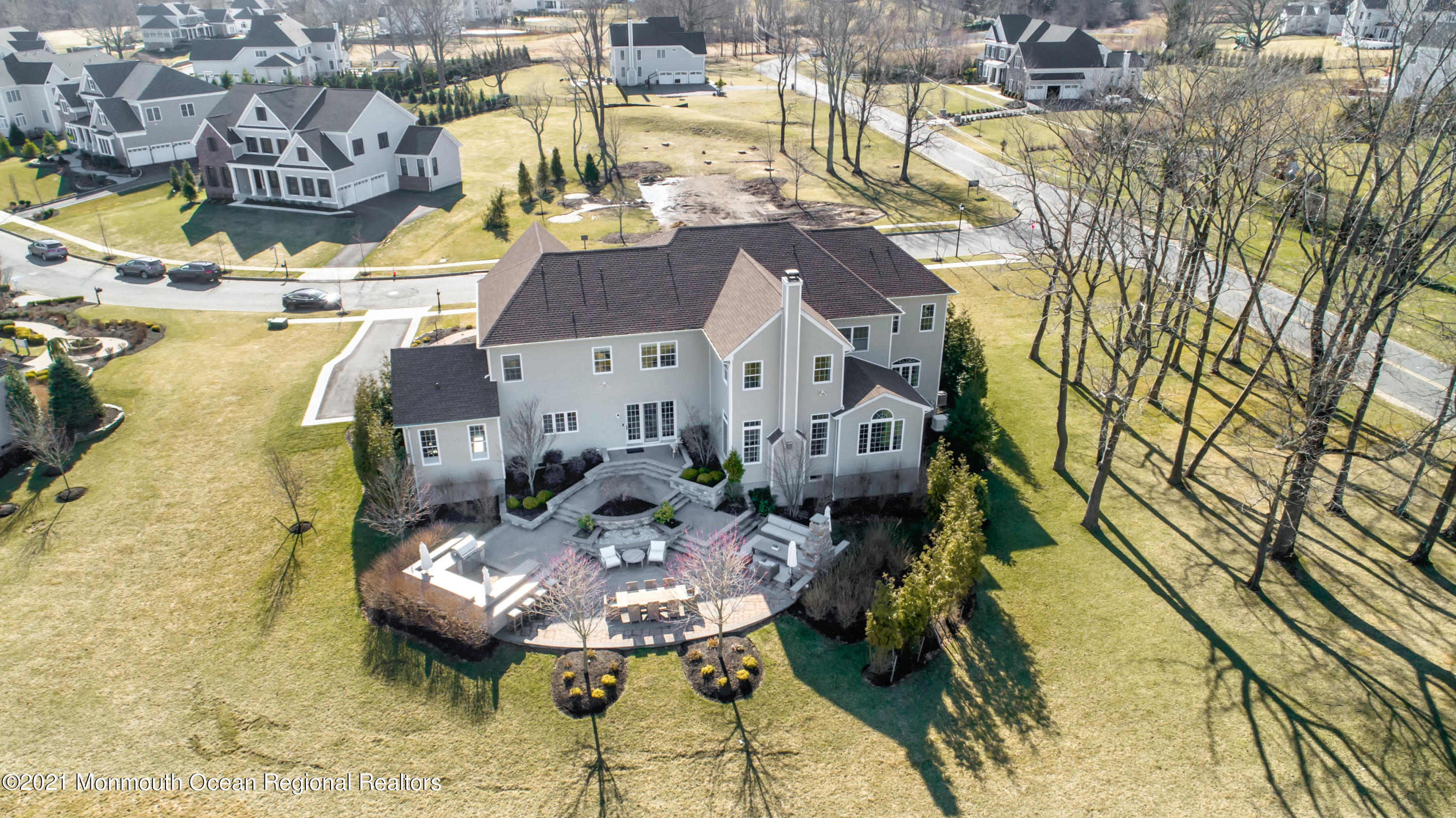 8 Strathmore Road Lincroft, NJ 07738 - Photo 74 of 76 a view of a swimming pool with a patio