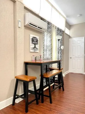 a view of a livingroom with furniture and dining room