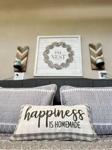 a view of room with furniture and wooden floor