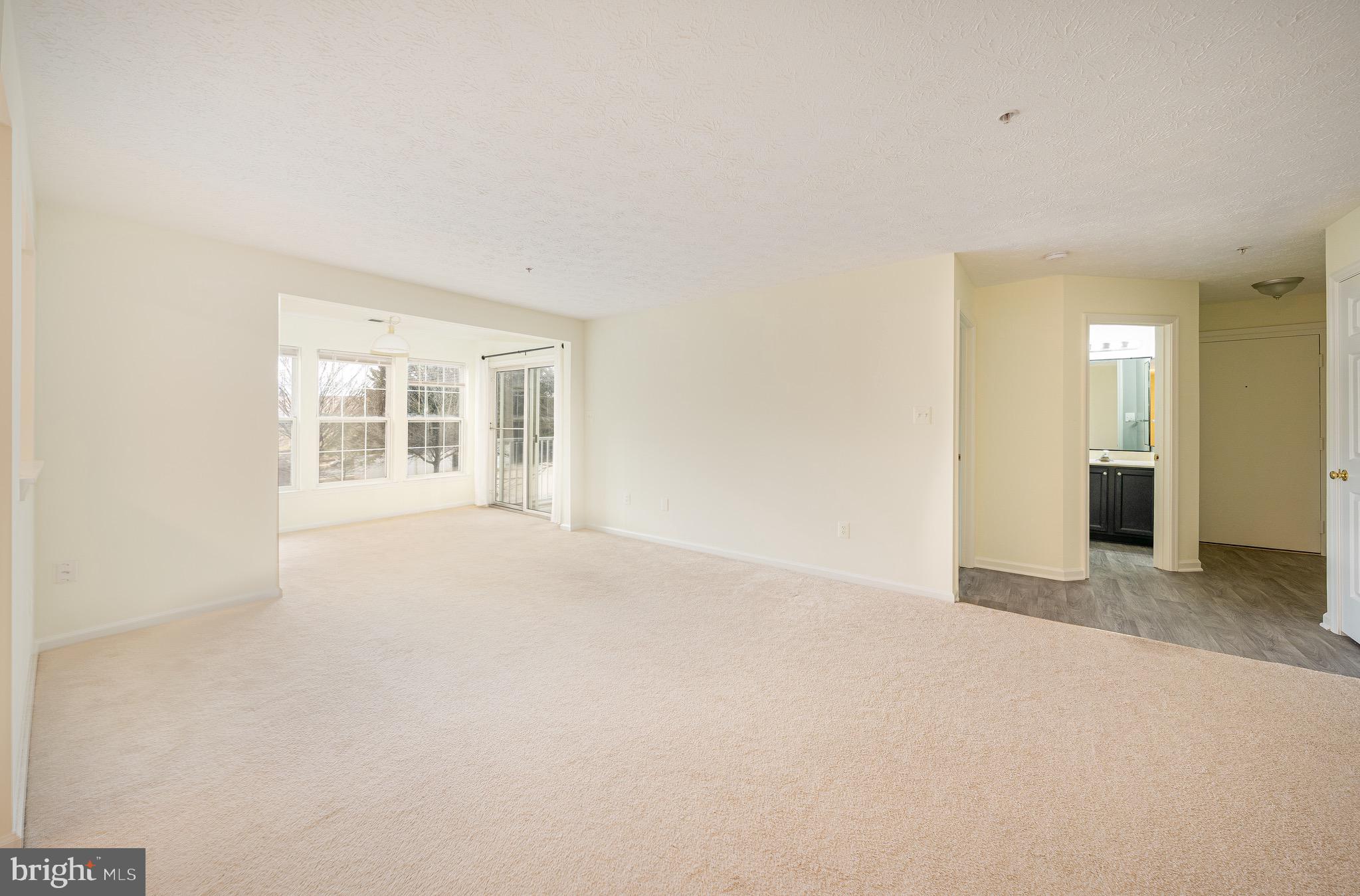 10105 Ridge Manor Terrace, Unit 3000H Damascus, MD 20872 - Photo 5 of 26 Living room/Dining Room