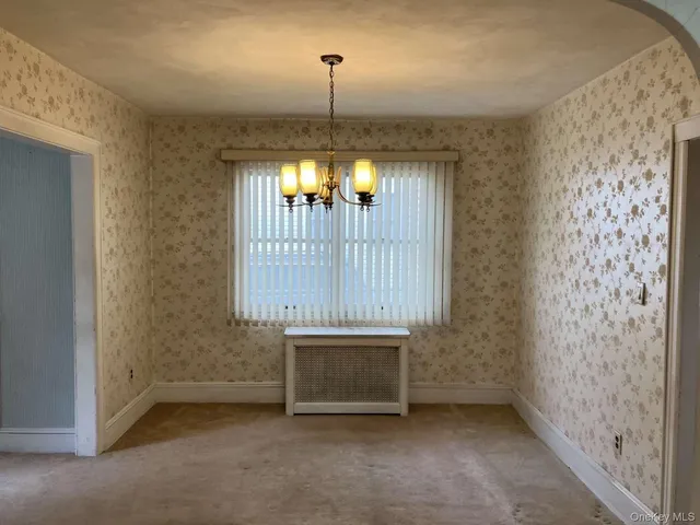 en empty room with a door