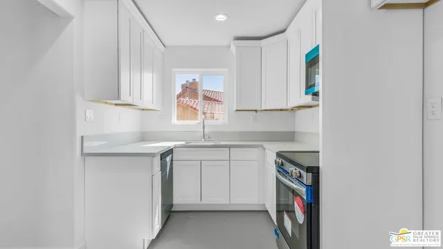 a bathroom with a tub shower and toilet