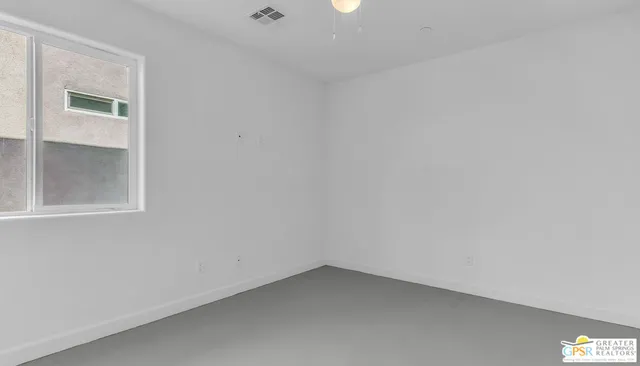 an aerial view of residential houses and city street