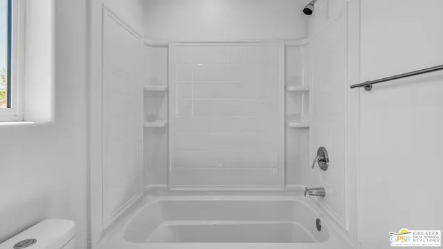 a view of a city with mountains