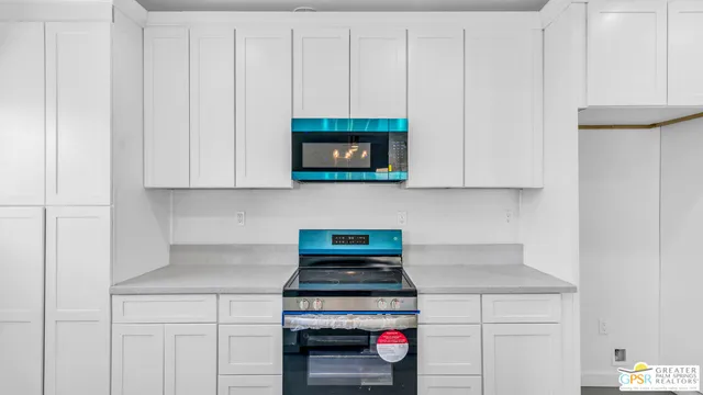 a kitchen with a sink and a window