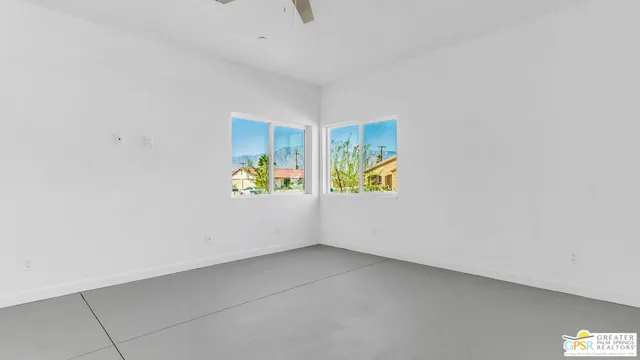 an empty room with windows