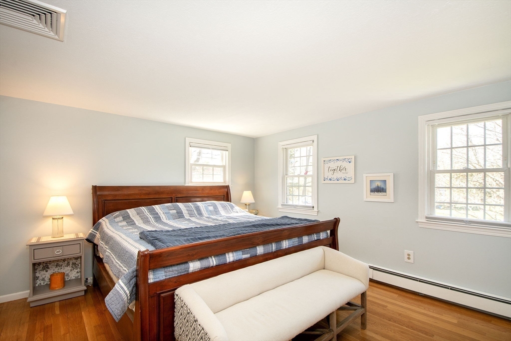 18 Longmeadow Road Scituate, MA 02066 - Photo 28 of 37 a bedroom with a bed and window