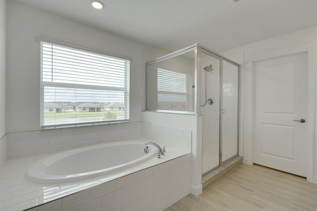 12328 Southwest Roma Circle Port St. Lucie, FL 34987 - Photo 42 of 72 Primary Bathroom to Walk-in.jpg-SMALL