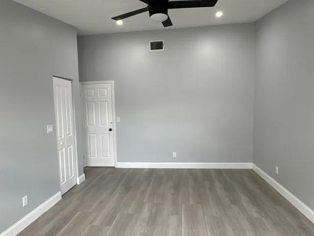 a bathroom with a toilet sink and a window