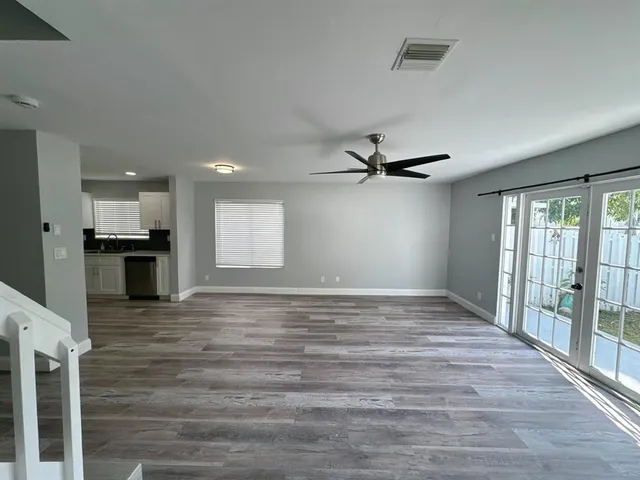 a kitchen with a refrigerator stove and microwave