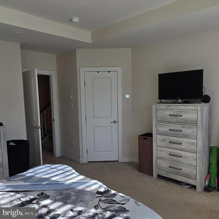 3174 Yeager Drive Herndon, VA 20171 - Photo 13 of 20 a bedroom with a bed and furniture