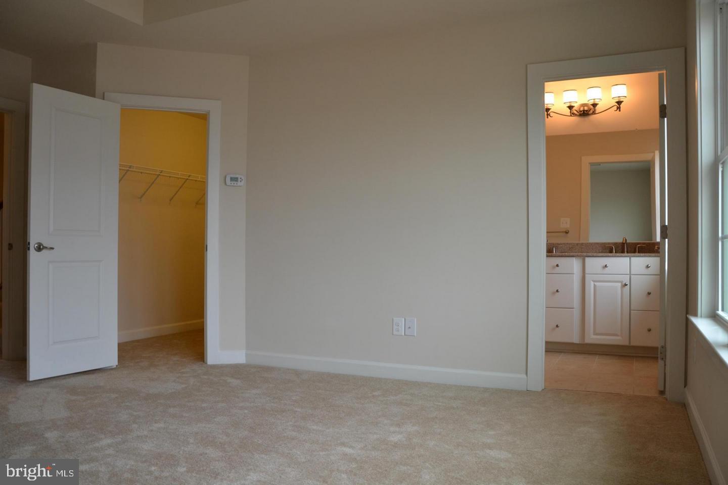 3174 Yeager Drive Herndon, VA 20171 - Photo 17 of 20 an empty room with a bathroom and a sink