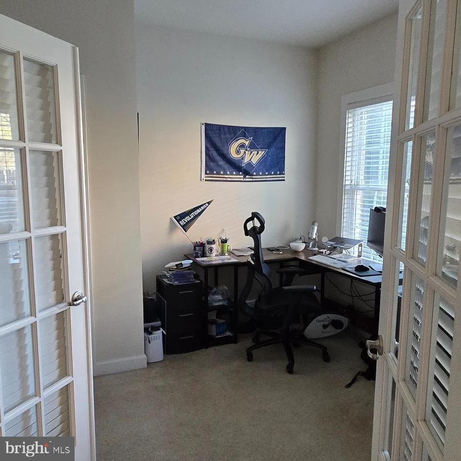 3174 Yeager Drive Herndon, VA 20171 - Photo 4 of 20 a view of a workspace with furniture