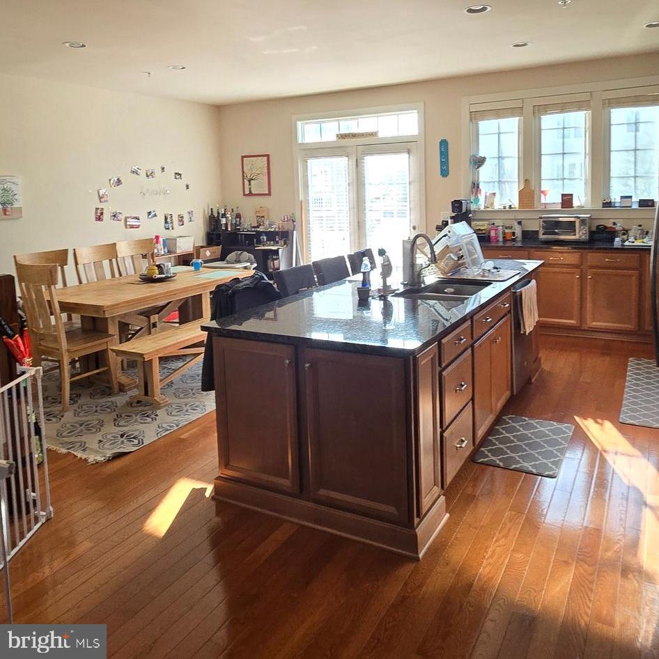 3174 Yeager Drive Herndon, VA 20171 - Photo 9 of 20 a kitchen with counter top space and windows