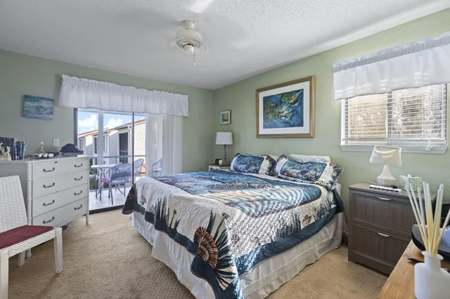 a bedroom with a bed and furniture