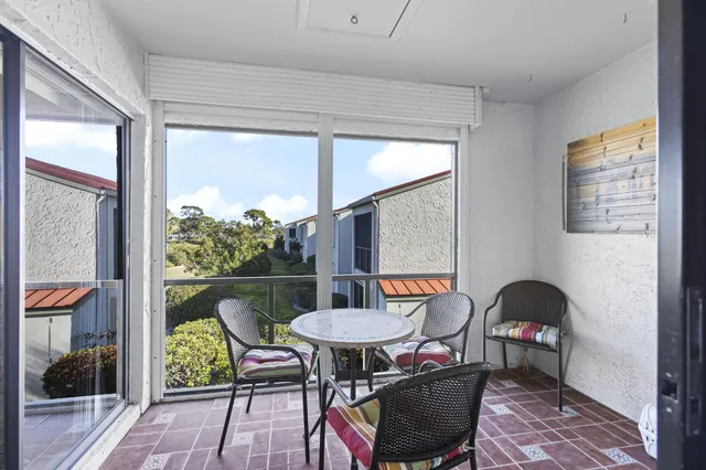 a view of a dining room with furniture wooden floor and a table