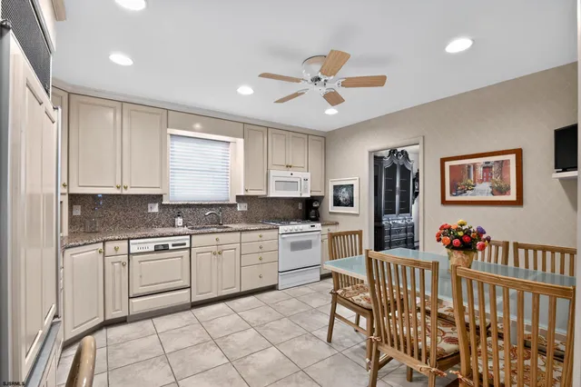 a bedroom with a bed and a table