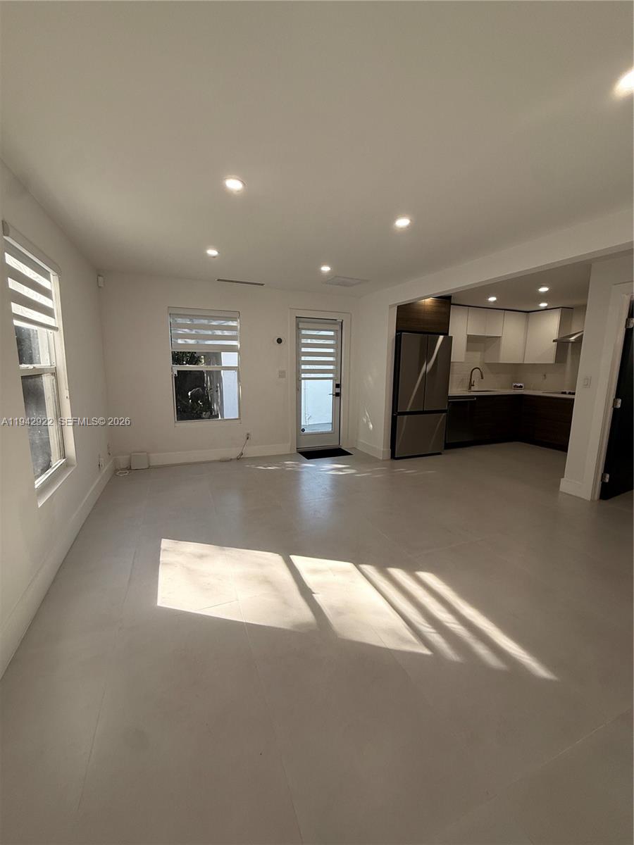 4430 Northwest 1st Avenue Miami, FL 33127 - Photo 11 of 31 a view of a big room with windows