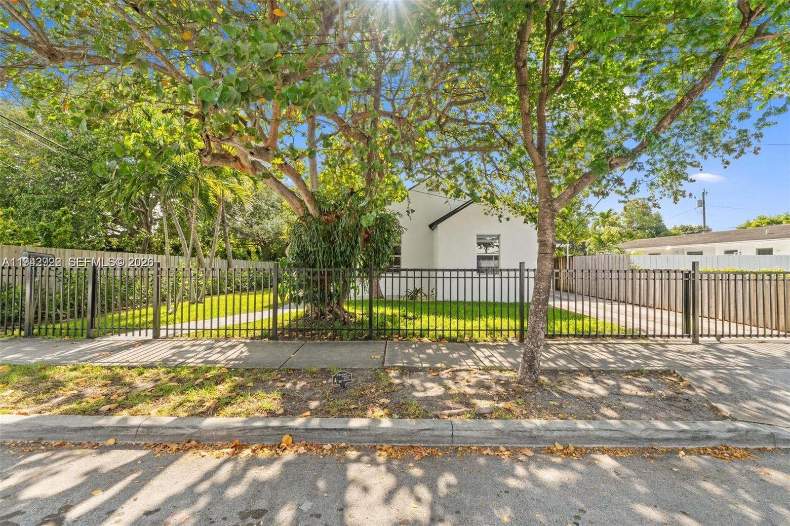 4430 Northwest 1st Avenue Miami, FL 33127 - Photo 2 of 31 a view of a yard with a trampoline