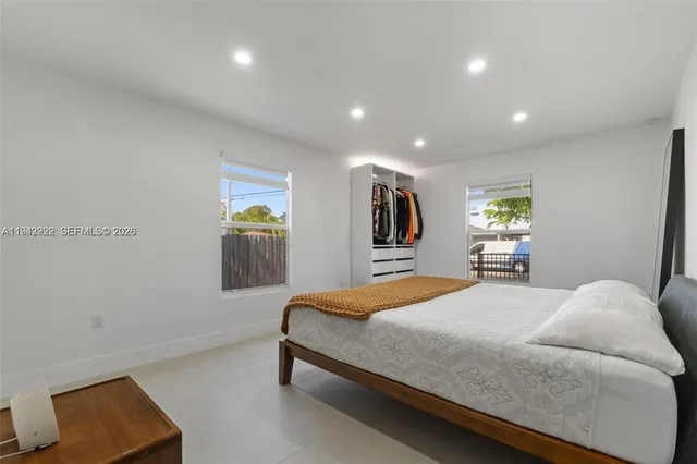 a bedroom with a bed