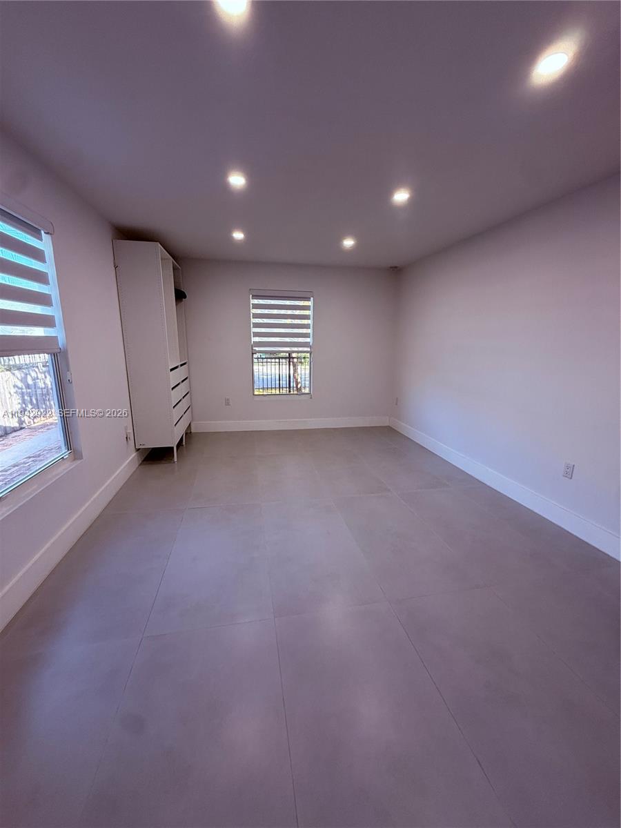 4430 Northwest 1st Avenue Miami, FL 33127 - Photo 23 of 31 an empty room with windows