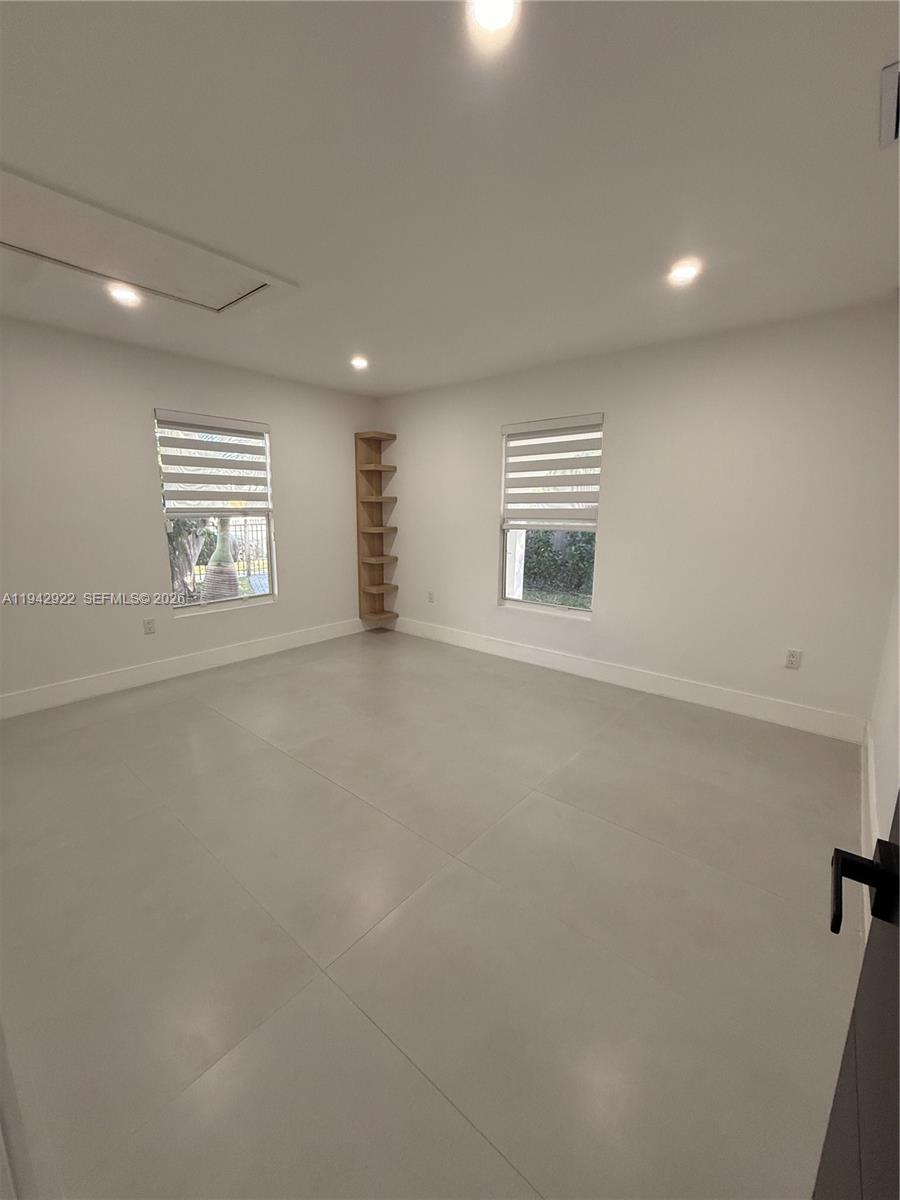 4430 Northwest 1st Avenue Miami, FL 33127 - Photo 28 of 31 an empty room with windows