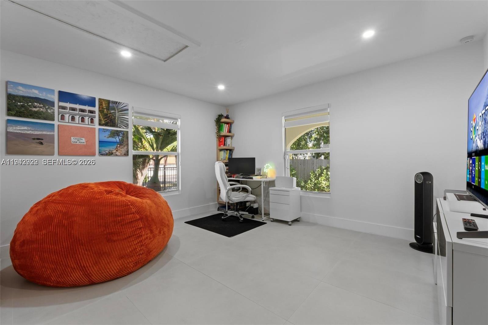 4430 Northwest 1st Avenue Miami, FL 33127 - Photo 29 of 31 a room with furniture and gym equipment