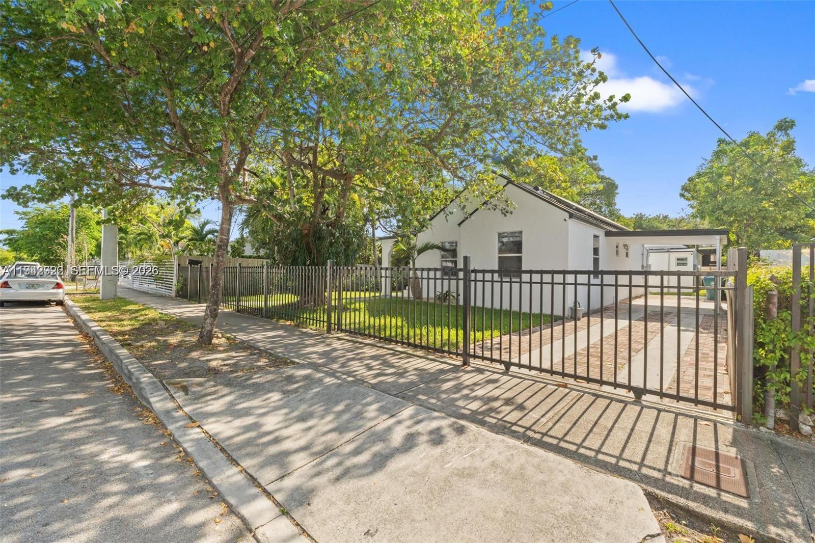 4430 Northwest 1st Avenue Miami, FL 33127 - Photo 3 of 31 a view of a house with a balcony