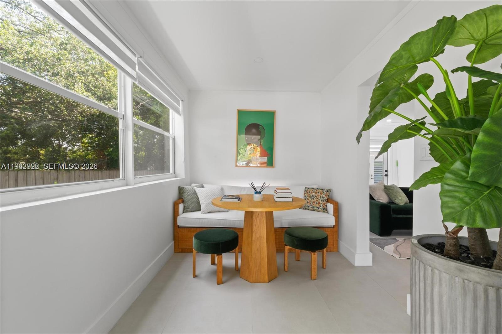 4430 Northwest 1st Avenue Miami, FL 33127 - Photo 7 of 31 a living room with patio furniture and a potted plant