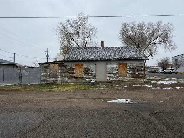 a view of a house with a street