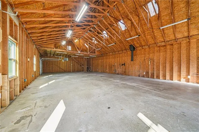 a view of a room with wooden walls