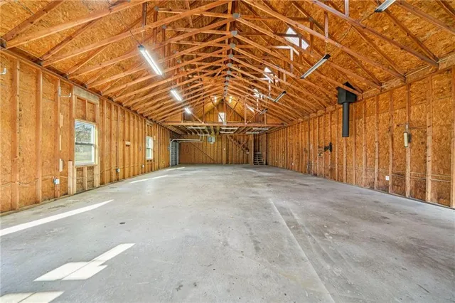 a view of a room with wooden fence
