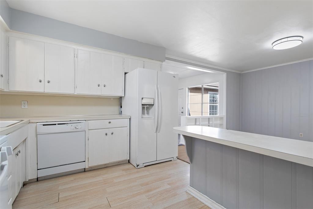 3126 Colgate Avenue Tyler, TX 75701 - Photo 7 of 33 a kitchen with white cabinets