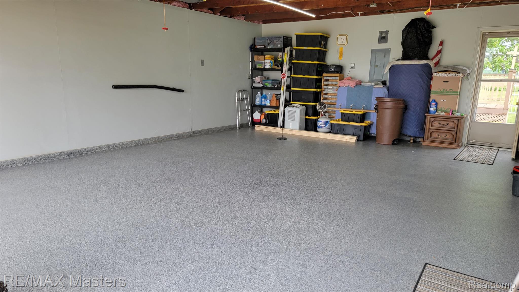 1957 Indian Trail Road Carleton, MI 48117 - Photo 11 of 25 New Epoxy Floor In Attached Garage, Insulated