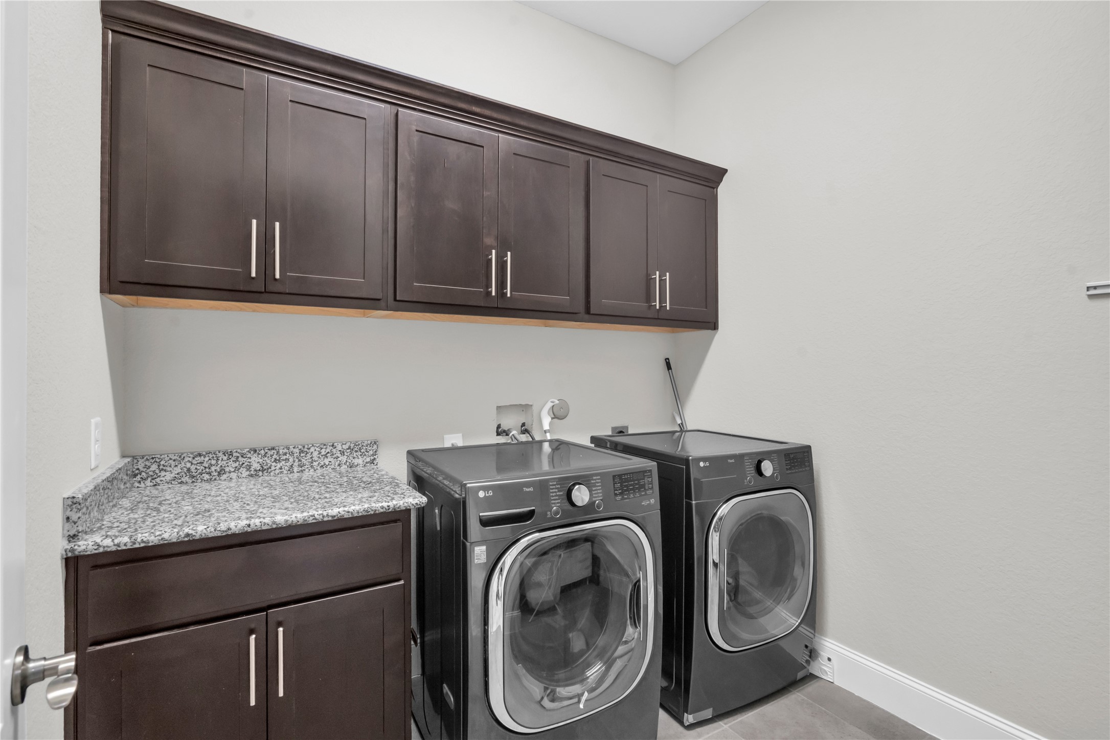 9842 Kirkstone Terrace Drive Spring, TX 77379 - Photo 18 of 34 Large utility room with lots of cabinet space and room for all those extra's