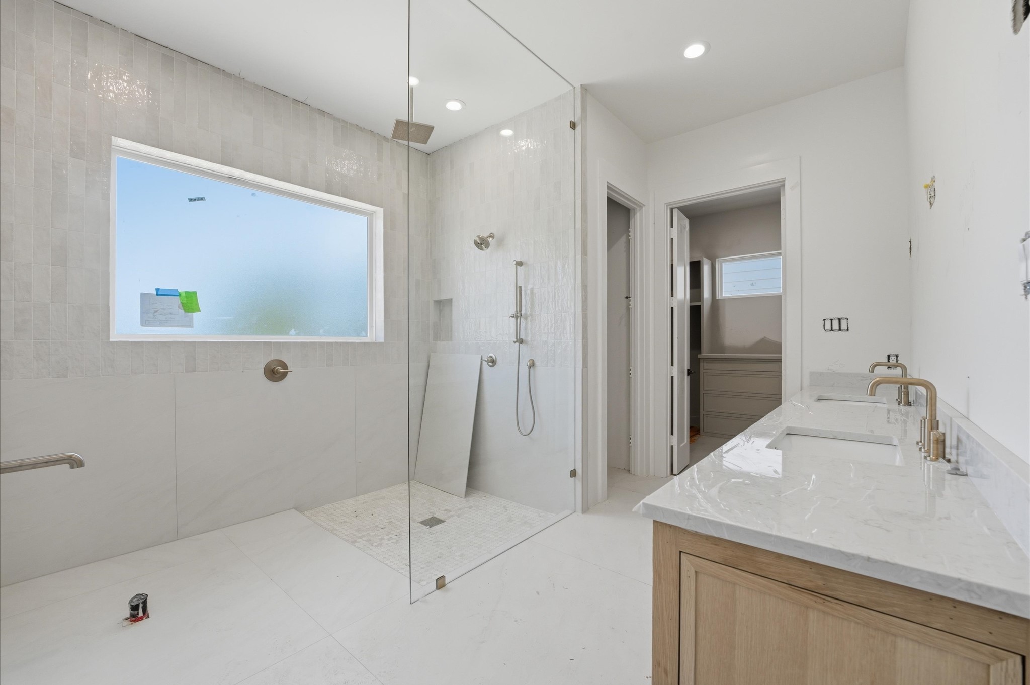609 East 25th Street Houston, TX 77008 - Photo 13 of 42 Large shower in the primary bathroom will also have a stand alone soaking tub.