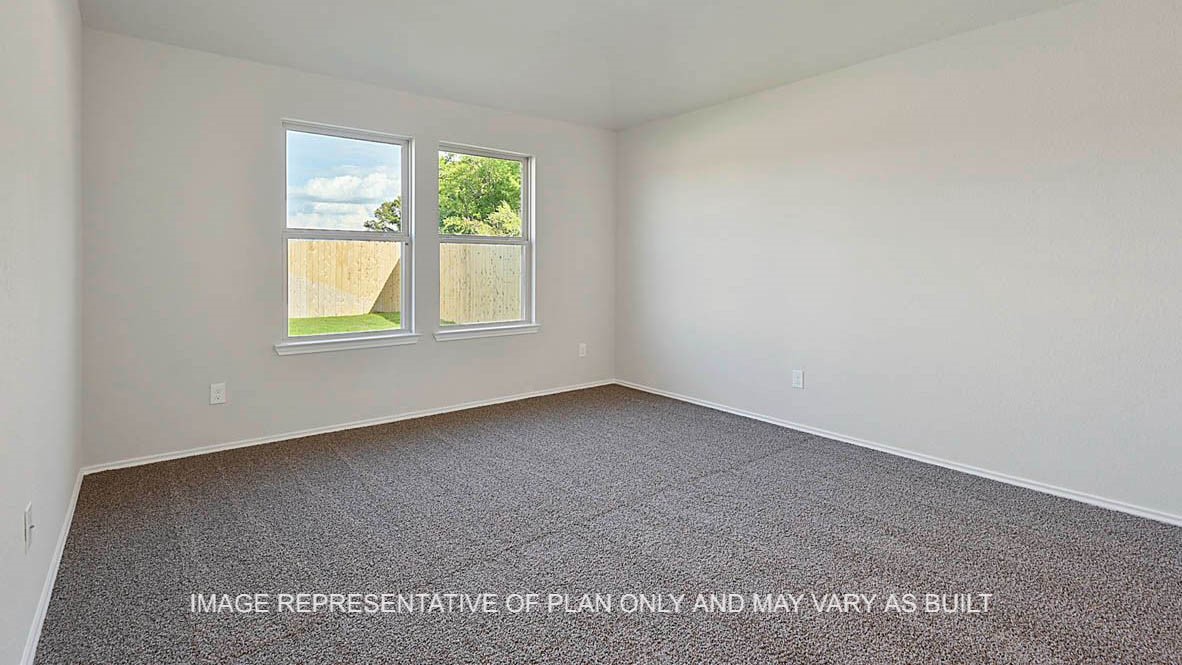 1026 Legrand Street Brenham, TX 77833 - Photo 11 of 16 an empty room with windows