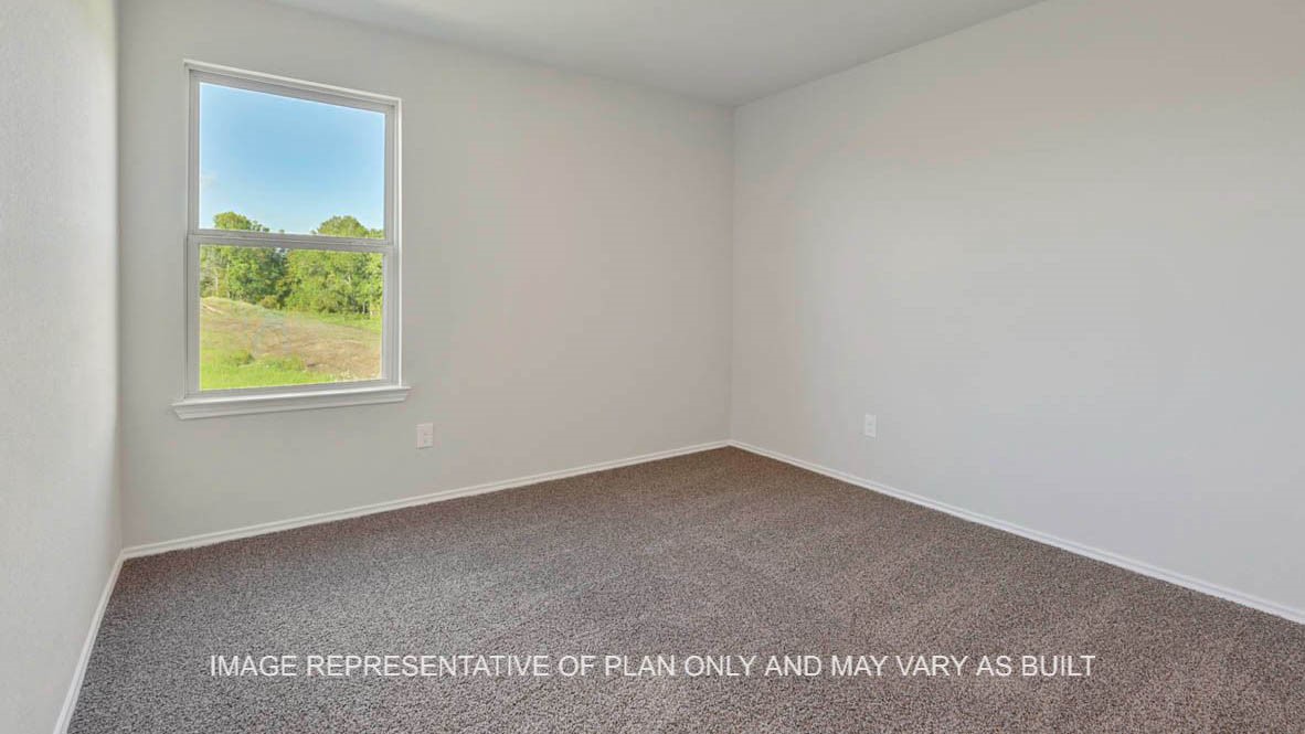 1026 Legrand Street Brenham, TX 77833 - Photo 6 of 16 a view of an empty room with a window