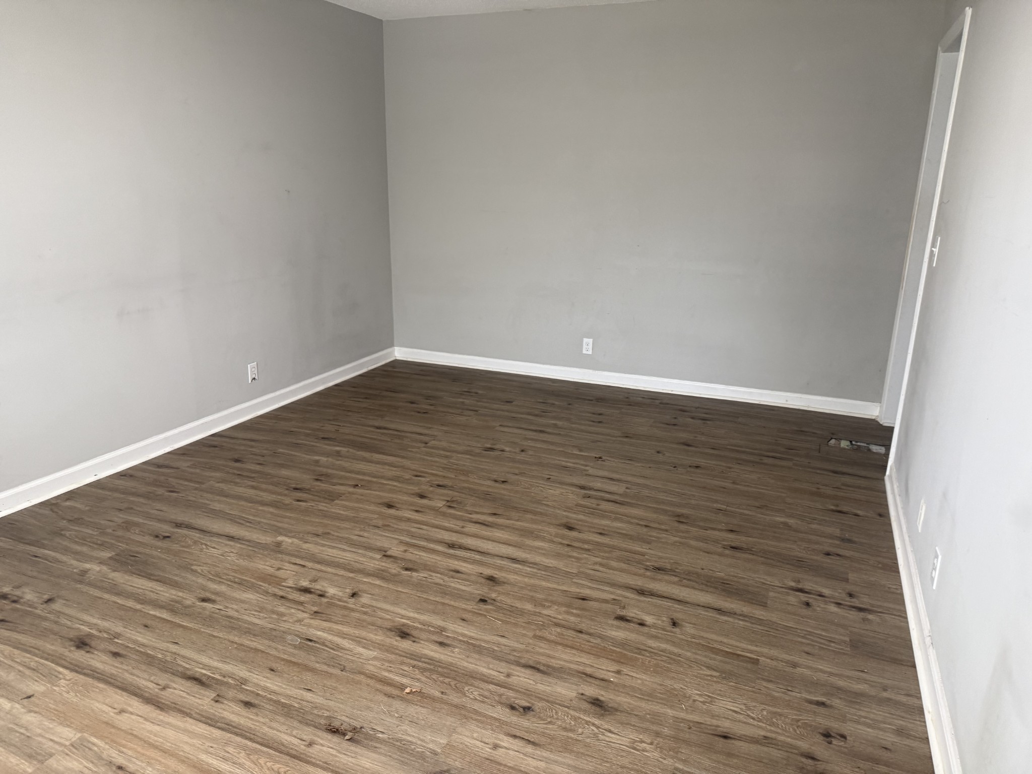 1533 Old Lascassas Road Murfreesboro, TN 37130 - Photo 17 of 17 a view of an empty room with wooden floor