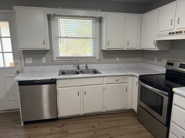 1533 Old Lascassas Road Murfreesboro, TN 37130 - Photo 3 of 17 a kitchen with granite countertop white cabinets sink and appliances