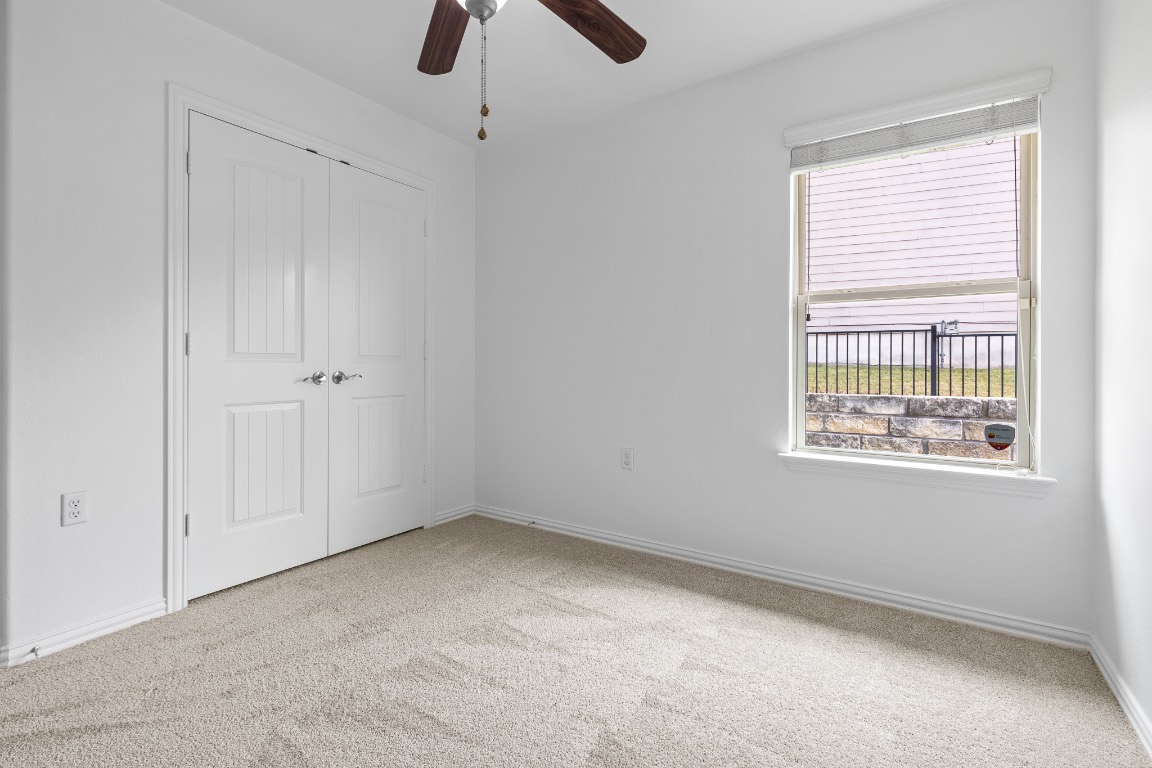 5621 Little Theater Bend Austin, TX 78747 - Photo 19 of 38 a view of an empty room with a window