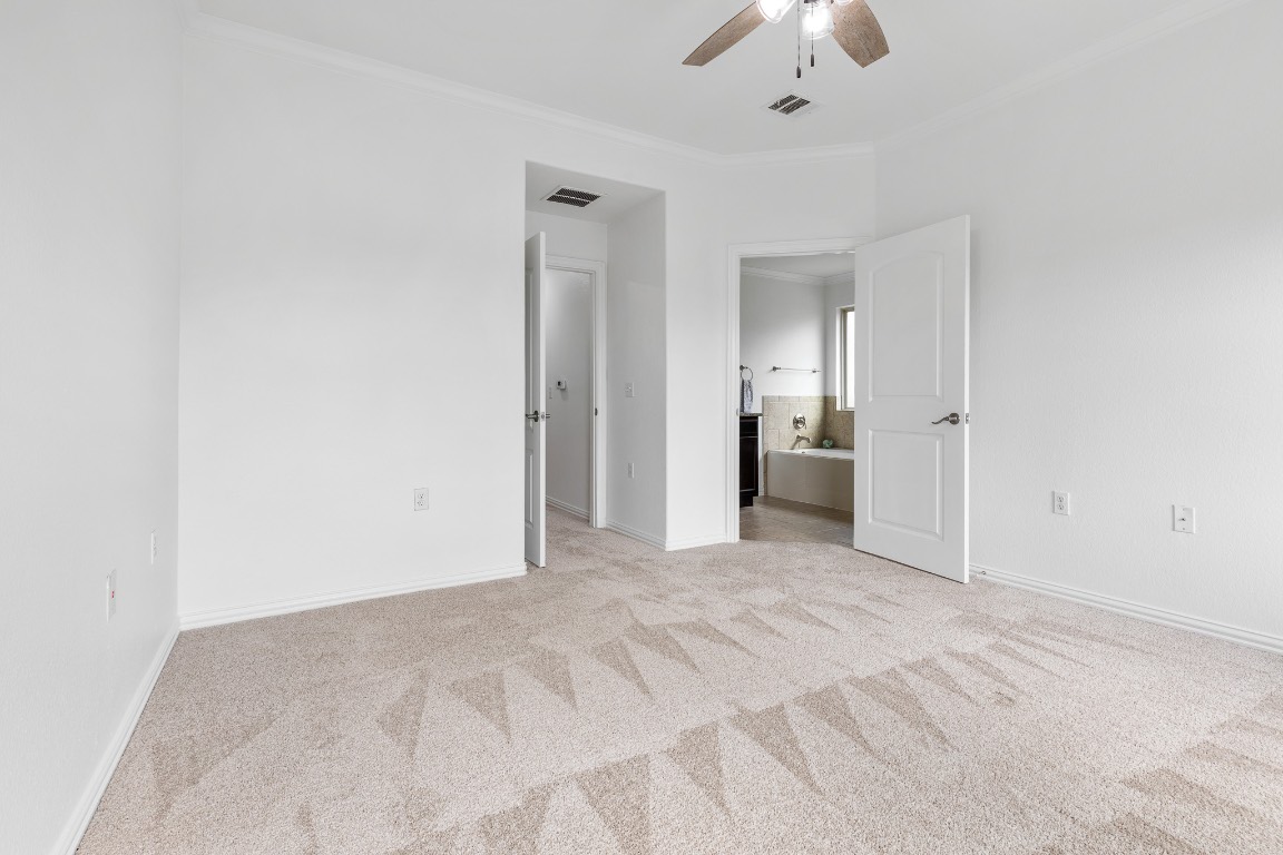 5621 Little Theater Bend Austin, TX 78747 - Photo 25 of 38 a view of an empty room with a bathroom