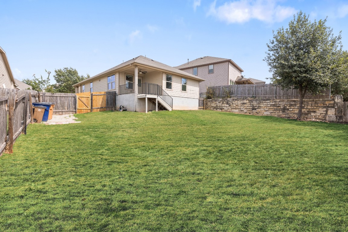 5621 Little Theater Bend Austin, TX 78747 - Photo 35 of 38 a big house with a big yard and large trees